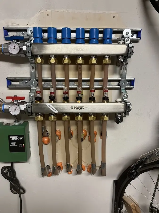 Plumber performing Leak Detection at a residential property in Menominee